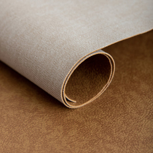 TESSUTO ECOPELLE MARTELLATA EFFETTO VINTAGE LEGGERMENTE ELASTICA